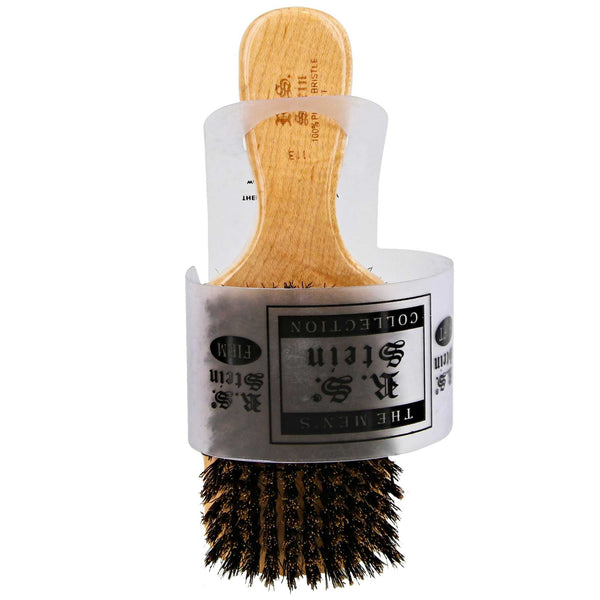 soft bristle side and a firmer bristle side brush