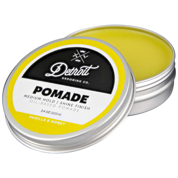 open tin of Detroit Grooming yellow pomade